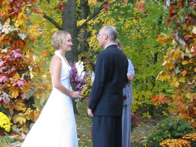 Jen and Scott getting married under a tree