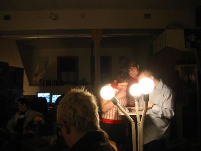 Party guests snooping in photo albums